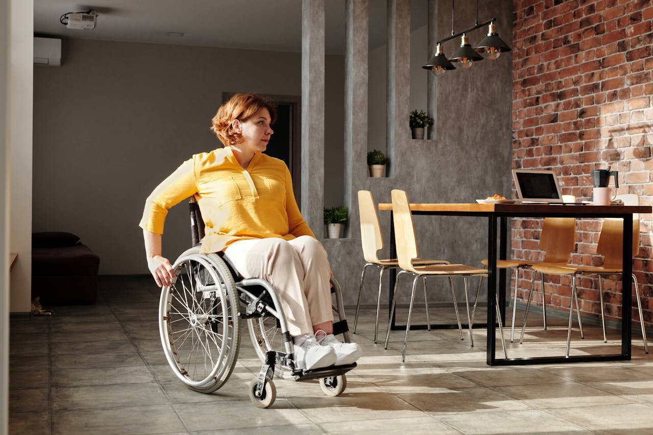 Woman Sitting in Wheelchair